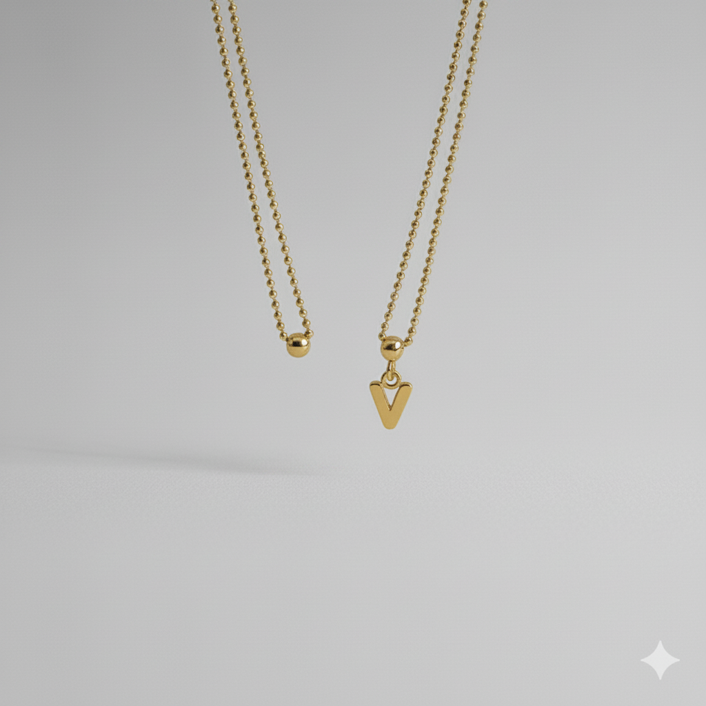 Collar letras mini (V) | Oro Chino Dorado