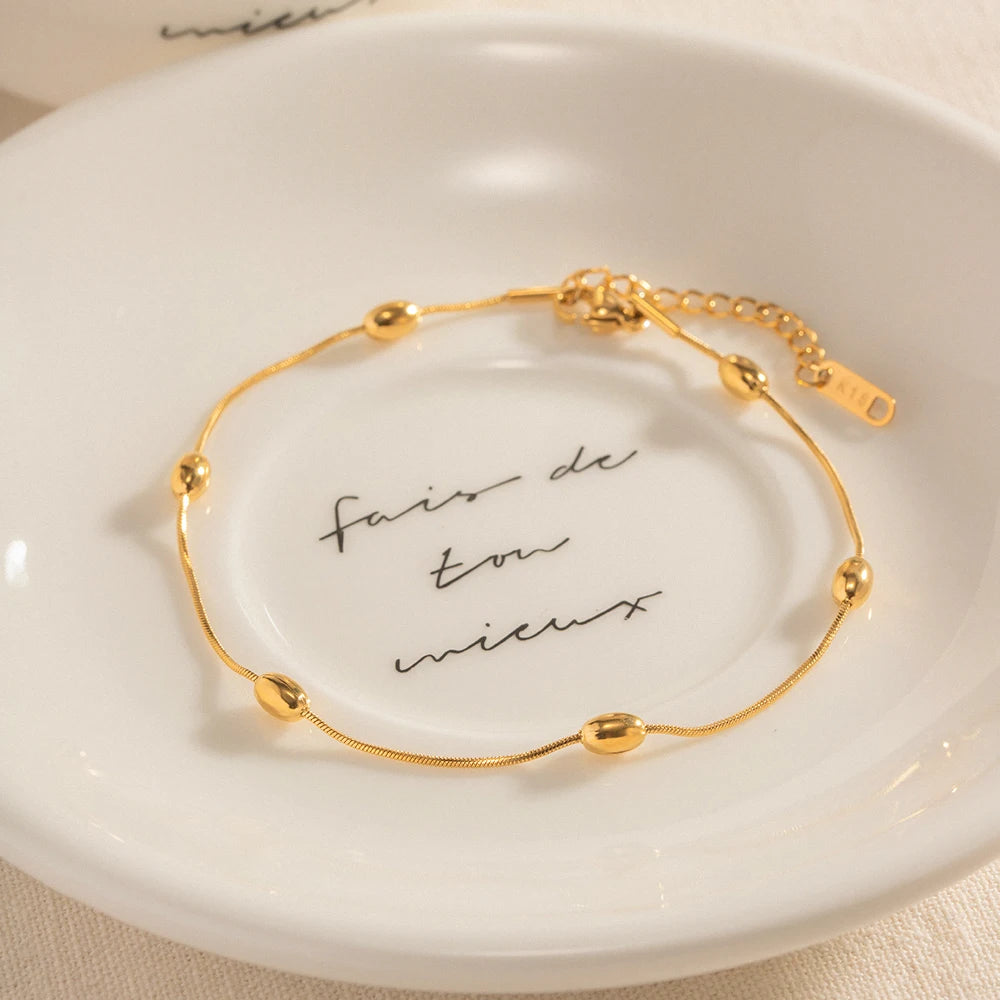 Pulsera Tejido Snake con Estaciones de Cuentas Lisas | Dorado