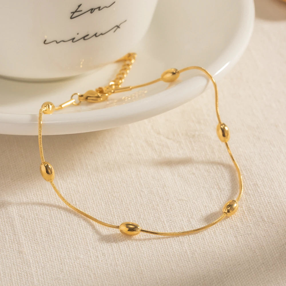 Pulsera Tejido Snake con Estaciones de Cuentas Lisas | Dorado