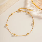 Pulsera Tejido Snake con Estaciones de Cuentas Lisas | Dorado