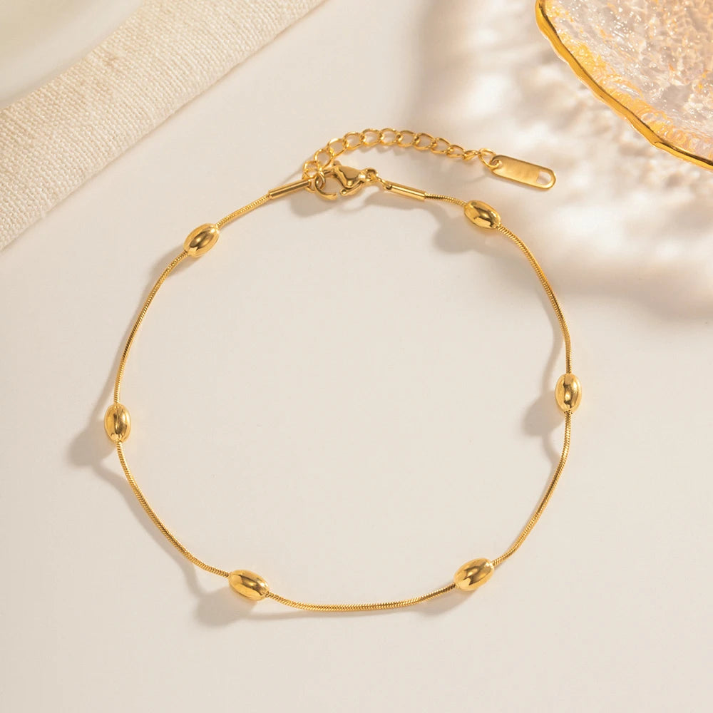 Pulsera Tejido Snake con Estaciones de Cuentas Lisas | Dorado