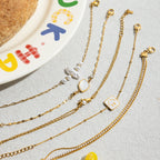 Pulseras de Hojas con Dije de Nácar Irregular y Circones | Dorado