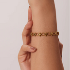 Pulsera De Eslabones Ovalados Con Detalles De Nudos Centrales | Dorado