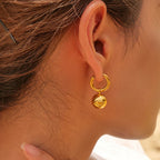 Argollas Colgante Ojo y Beso | Dorado