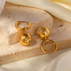 Argollas Colgante Ojo y Beso | Dorado