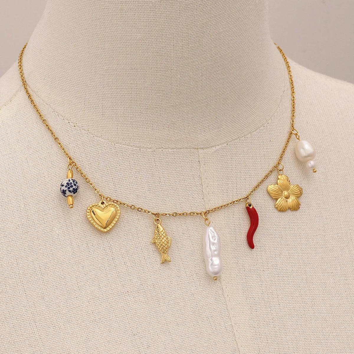 Collar Multi Dijes Flor Y Pez | Dorado