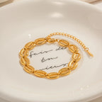 Pulsera con Conchas Marinas Cauri | Dorado