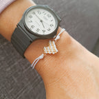 Pulsera de hilo Blanca | Plástico Dorado