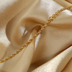 Pulsera Fina De Estilo Entorchado | Dorado