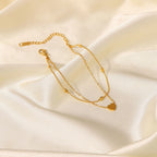 Tobillera Multicapa Con Corazon Liso Y Esferas | Dorado