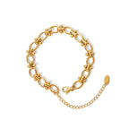 Pulsera De Eslabones Ovalados Con Detalles De Nudos Centrales | Dorado