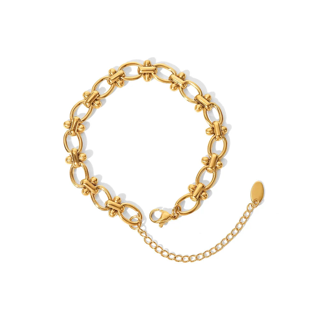 Pulsera De Eslabones Ovalados Con Detalles De Nudos Centrales | Dorado