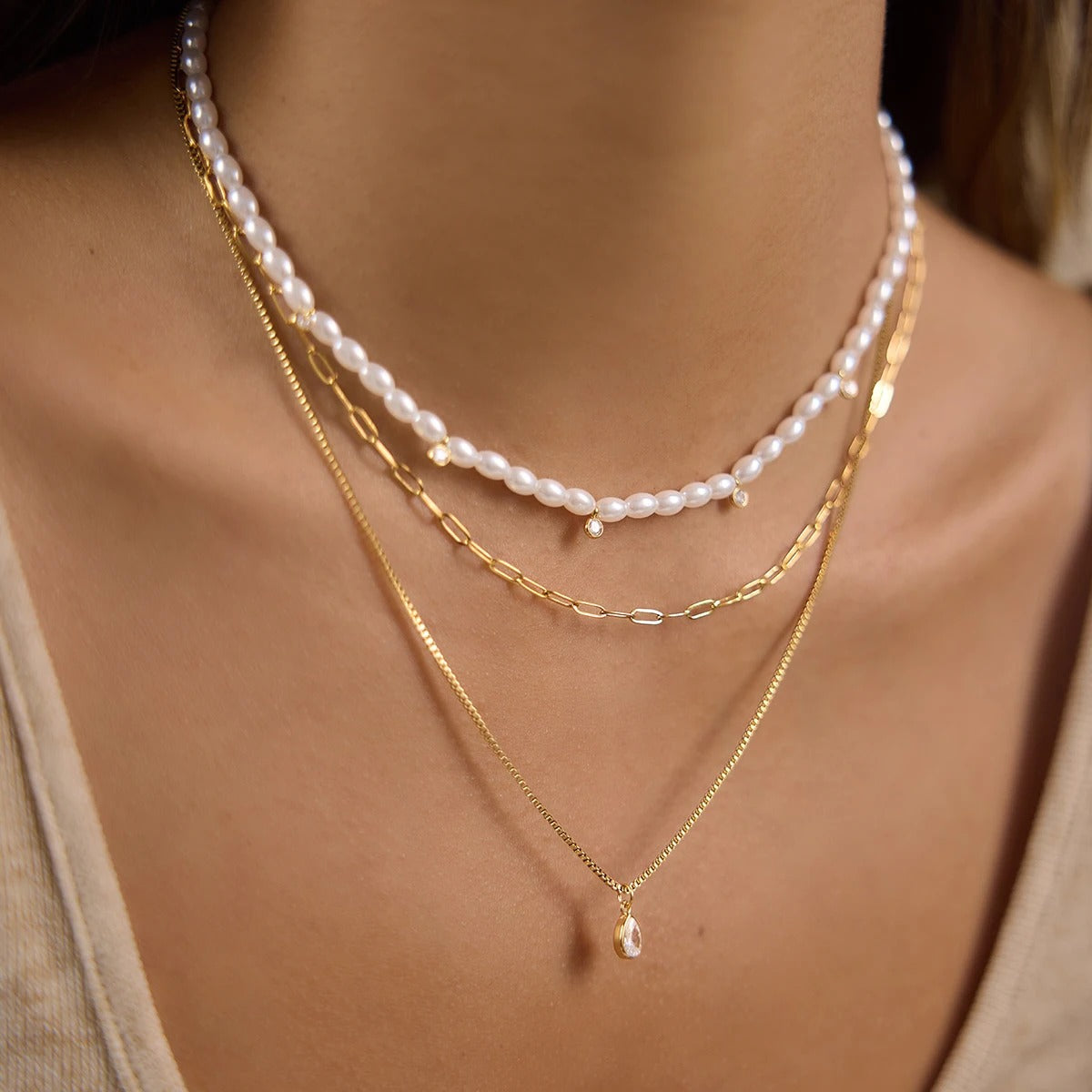 Collar Triple Suspiro del Mar | Dorado y Perla