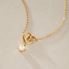Collar Corazón Swirl y Punto de Luz | Dorado
