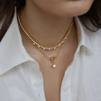 Collar Corazón Swirl y Punto de Luz | Dorado