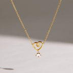 Collar Corazón Swirl y Punto de Luz | Dorado