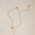 Collar Corazón Swirl y Punto de Luz | Dorado